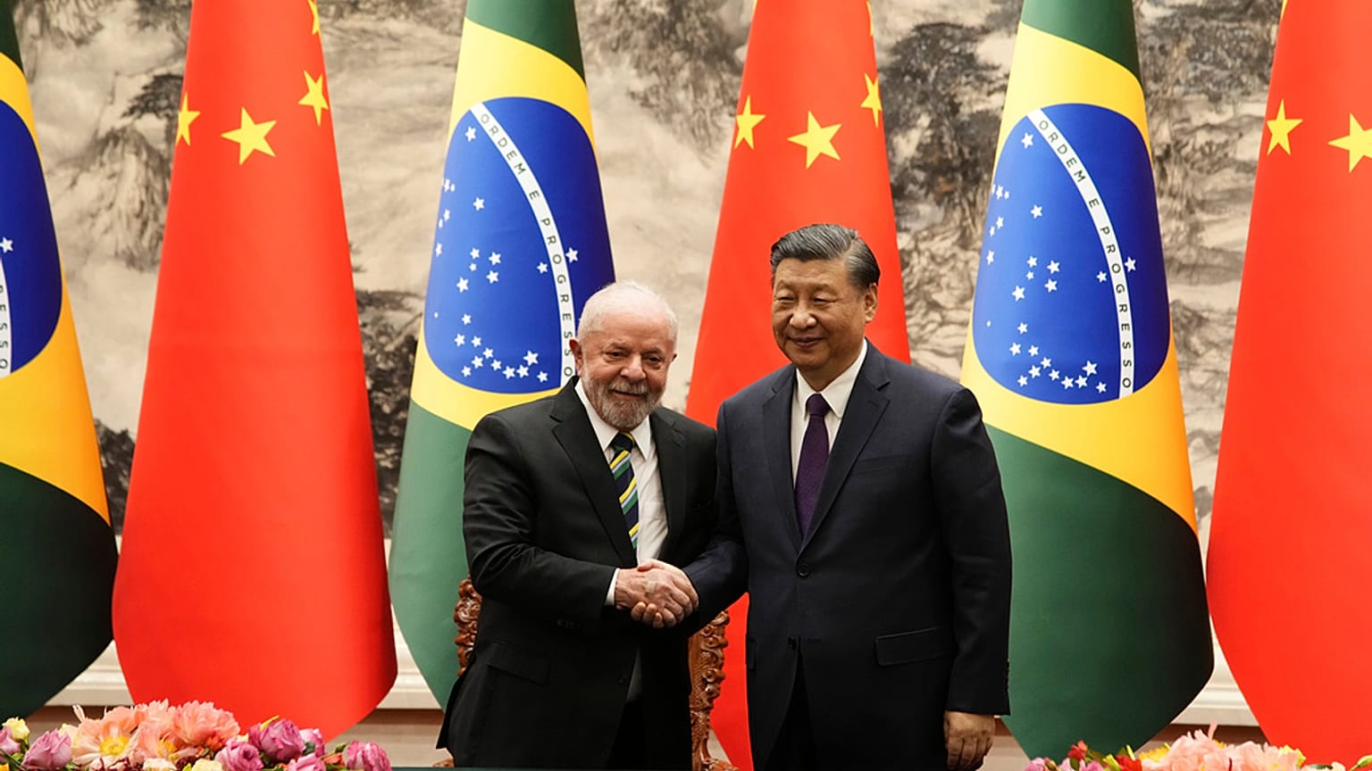 Brazilian President Luiz Inacio Lula da Silva, left, shakes hands with Chinese President Xi Jinping in Beijing, Friday, April 14, 2023