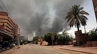 Smoke is seen rising from a neighborhood in Khartoum, Sudan, Saturday, April 15, 2023.