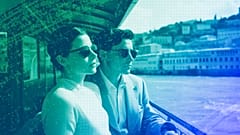 An illustration of a young couple enjoying their vacation in the Mediterranean