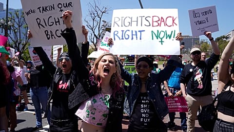 Supporters cheer up as Vice President Kamala Harris gives remarks at the Women's March in Los Angeles Saturday, April 15, 2023.