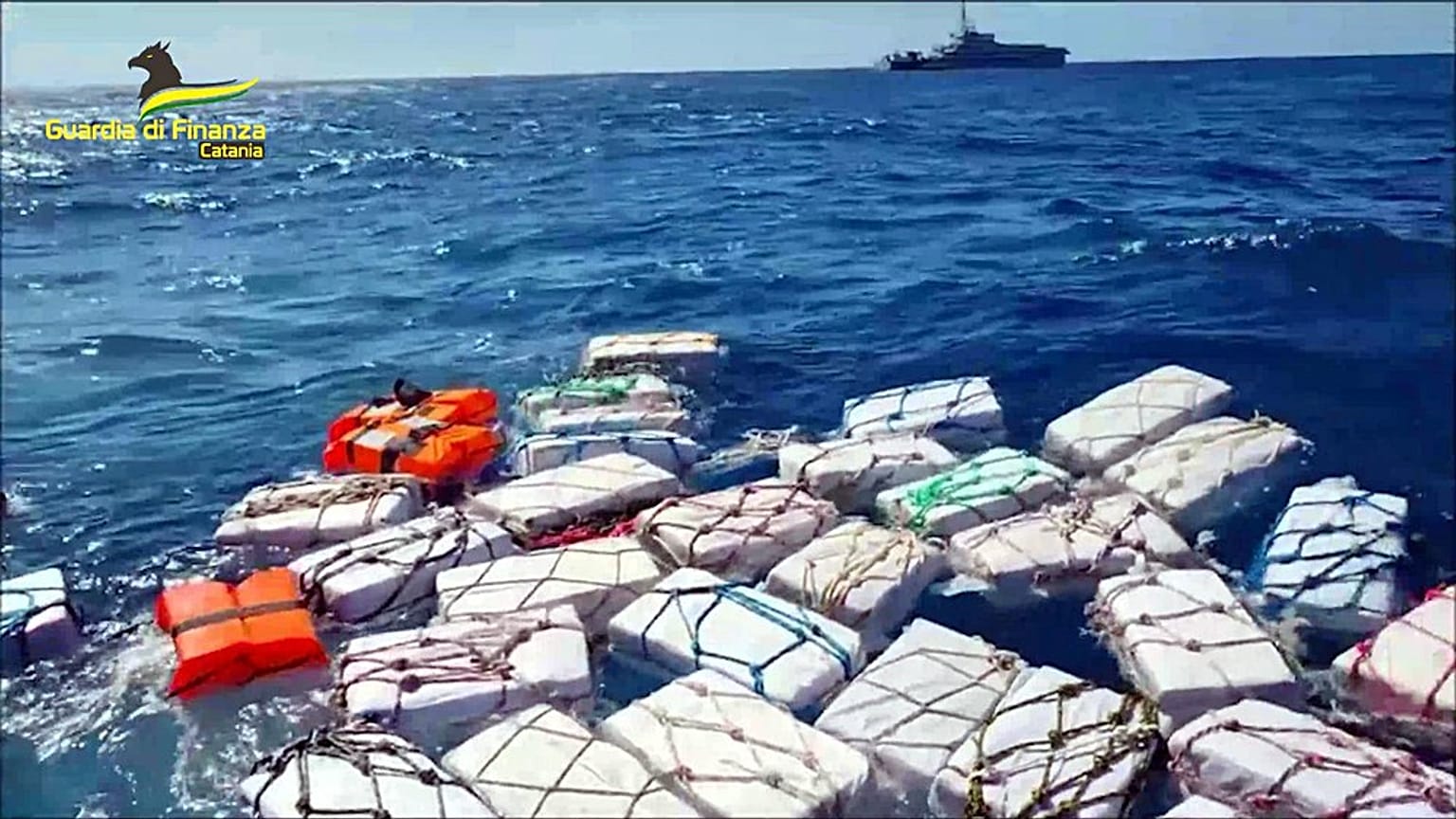 Italian police have seized about 70 packages containing almost 2 tonnes of cocaine floating off eastern Sicily.