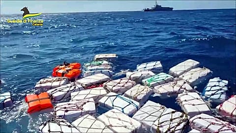 Italian police have seized about 70 packages containing almost 2 tonnes of cocaine floating off eastern Sicily.