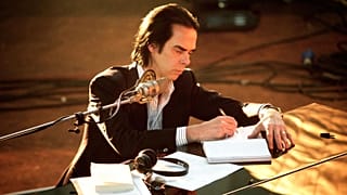 Nick Cave has said that "highly problematic" art can be enjoyable - seen here during the filming of 'One More Time With Feeling'