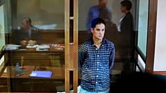 O repórter do WSJ, Evan Gershkovich, durante a audiência no tribunal