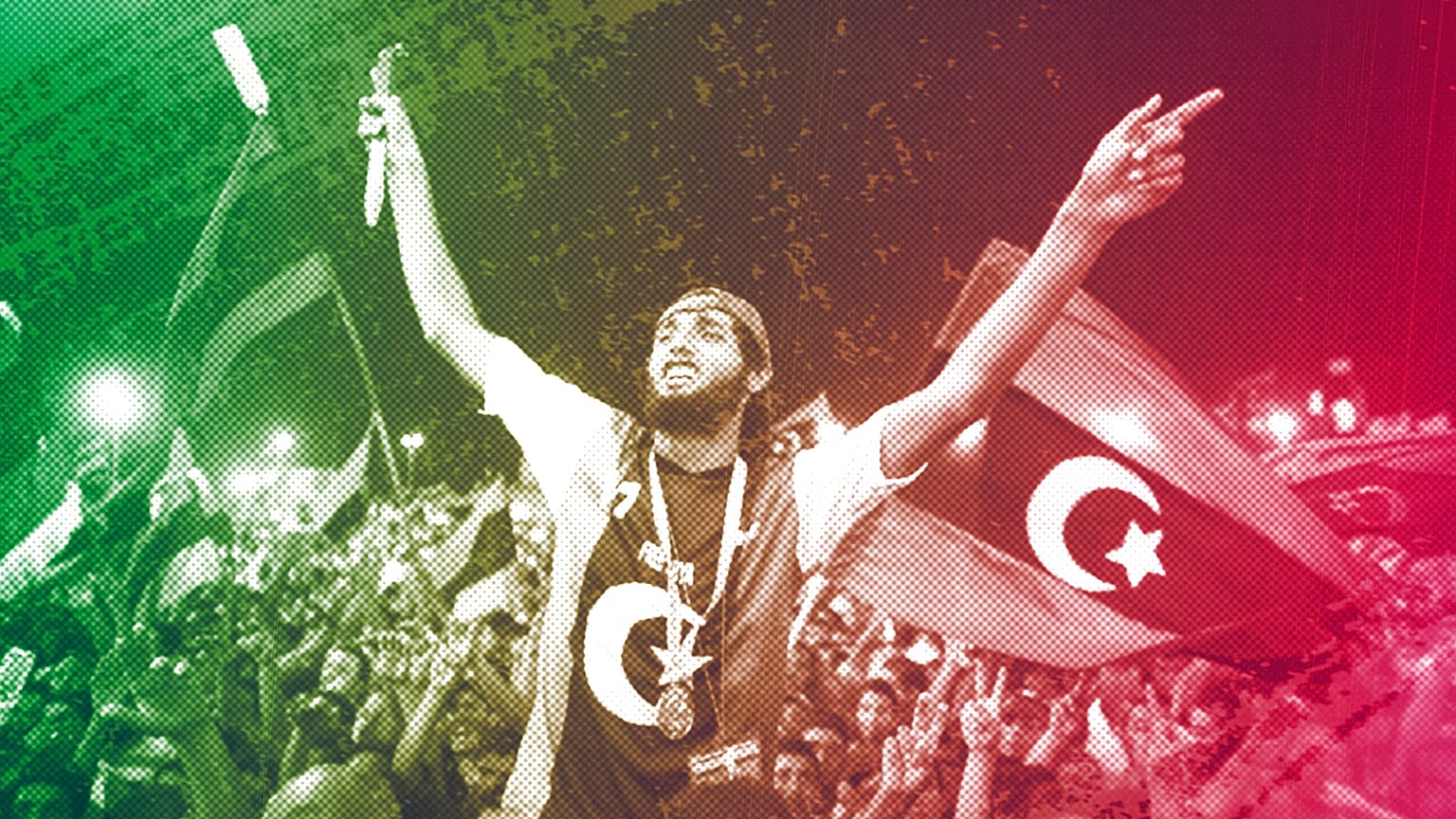 People celebrate the capture in Tripoli of Moammar Gadhafi's son and one-time heir apparent, Seif al-Islam, at the rebel-held town of Benghazi, 22 August 2011