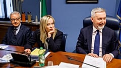 Italian Premier Giorgia Meloni, center, waits to start her briefing to COPASIR parliamentary intelligence commission in Rome.