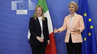 European Commission President Ursula von der Leyen, right, greets Italian Prime Minister Giorgia Meloni prior to a meeting at EU headquarters in Brussels, Nov. 3, 2022.