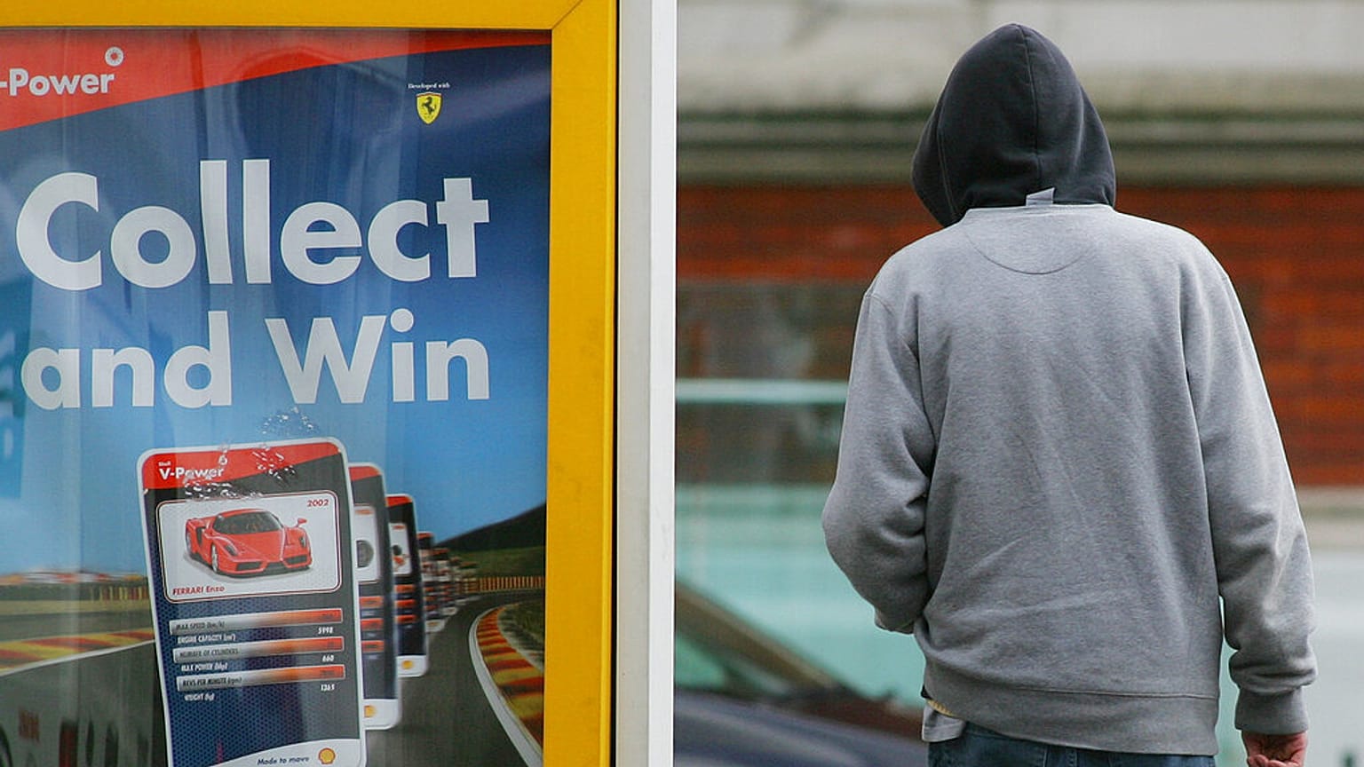 A young man wearing a hooded top on a cold day in London Tuesday March 20, 2007. 