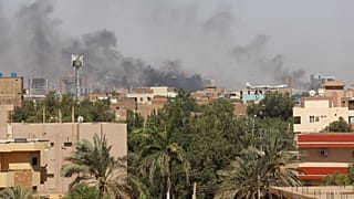 Smoke is seen in Khartoum, Sudan, Wednesday, April 19, 2023. Terrified Sudanese are fleeing their homes in the capital Khartoum, witnesses say.