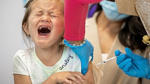Ansley Dinkler, 4, reacts as a COVID-19 vaccination is administered into her arm at Children's Hospital New Orleans, on Tuesday, June 21, 2022. 