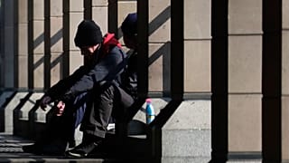 FILE: Homeless person in London, UK, March 2020