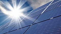 Glass solar panels are often too heavy for use on commercial buildings.
