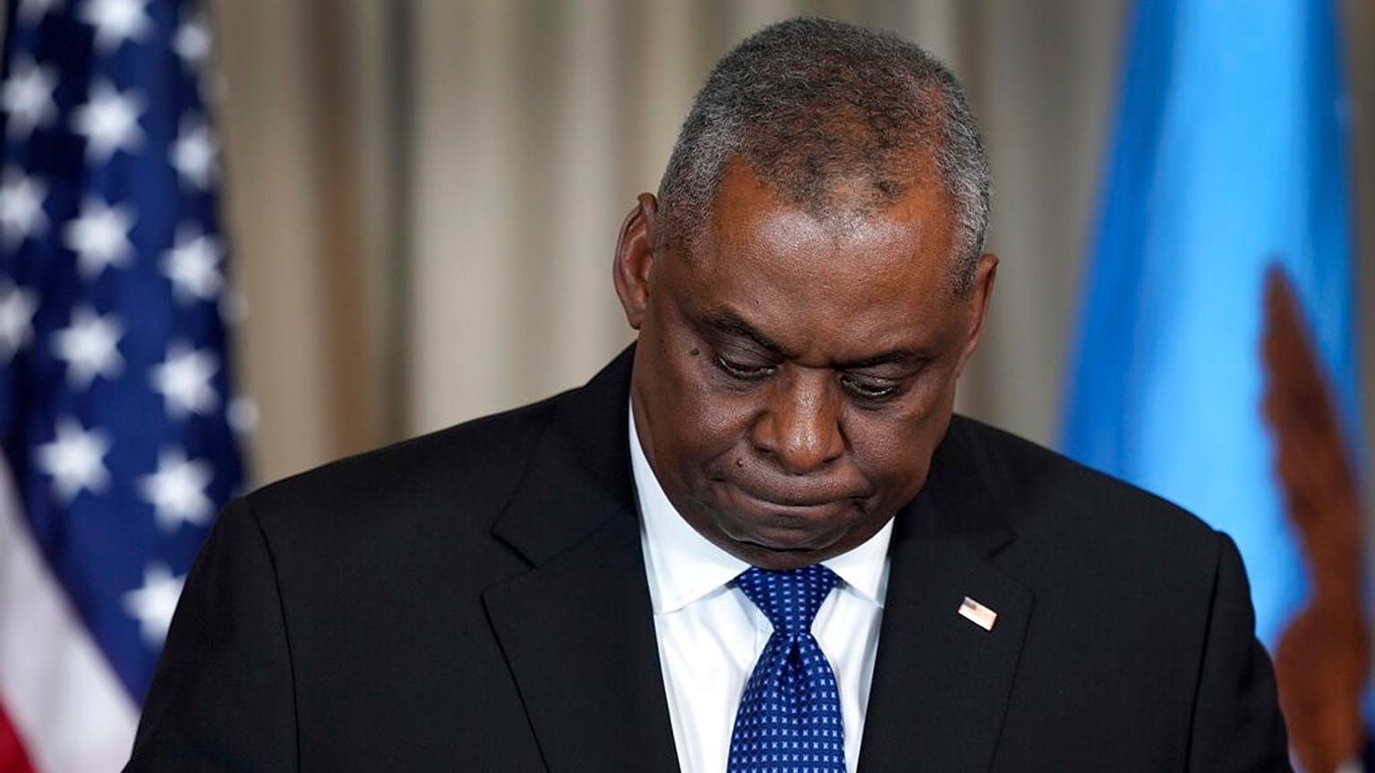 US Defense Secretary Lloyd Austin looks down during a press conference as part of the meeting of the 'Ukraine Defense Contact Group' at Ramstein Air Base in Ramstein, Germany.