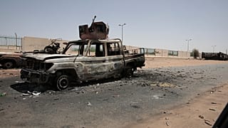 Destroyed military vehicles are seen in southern in Khartoum, Sudan, Thursday, April 20, 2023.