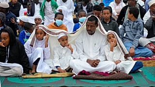 Muslims gather for prayers to celebrate Eid al-Adha, or Feast of Sacrifice, that commemorates the Prophet Ibrahim's faith, in Nairobi, Kenya, Saturday, July, 9, 2022.