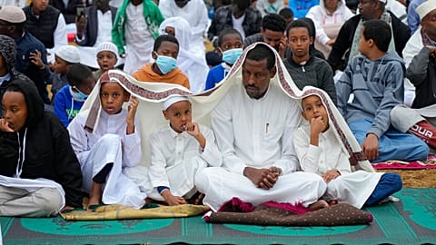 Muslims gather for prayers to celebrate Eid al-Adha, or Feast of Sacrifice, that commemorates the Prophet Ibrahim's faith, in Nairobi, Kenya, Saturday, July, 9, 2022.