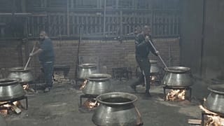 Cooking Ramadan dish akhni on wood fires in South Africa