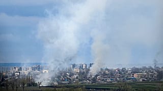Smoke billows from the town of Bakhmut, Donetsk region, on April 22, 2023