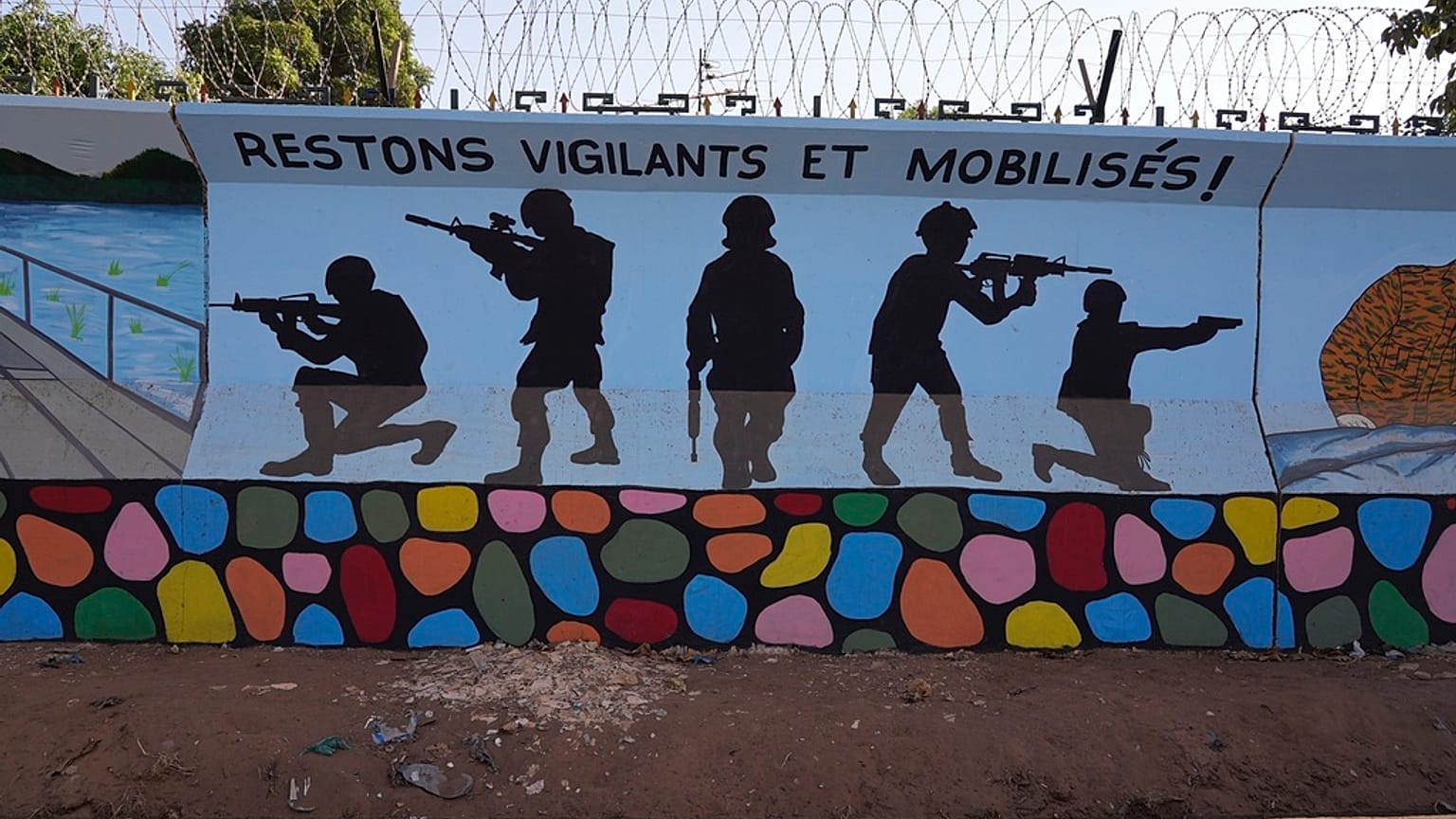 A mural is seen in Ouagadougou, Burkina Faso, on March 1, 2023. Burkina Faso's government has opened investigations into allegations of human rights abuses. 
