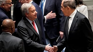 Antonio Guterres shakes hands with Russian FM Sergei Lavrov ahead of the meeting