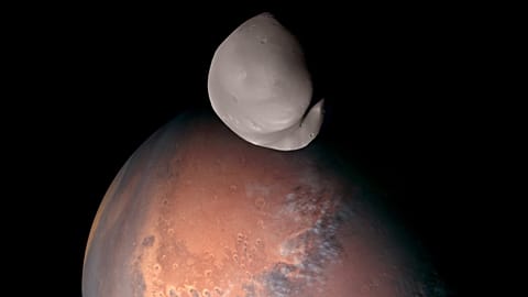 Deimos with Mars in the background