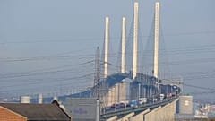 Morgan Trowland and Marcus Decker scaled the QEII Bridge last October for 36 hours, in a bid to get the government to end new oil and gas licences.