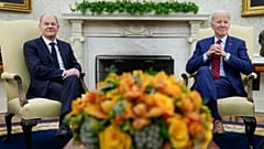 FILE: President Joe Biden meets with German Chancellor Olaf Scholz in the Oval Office of the White House in Washington, Friday, March 3, 2023. 