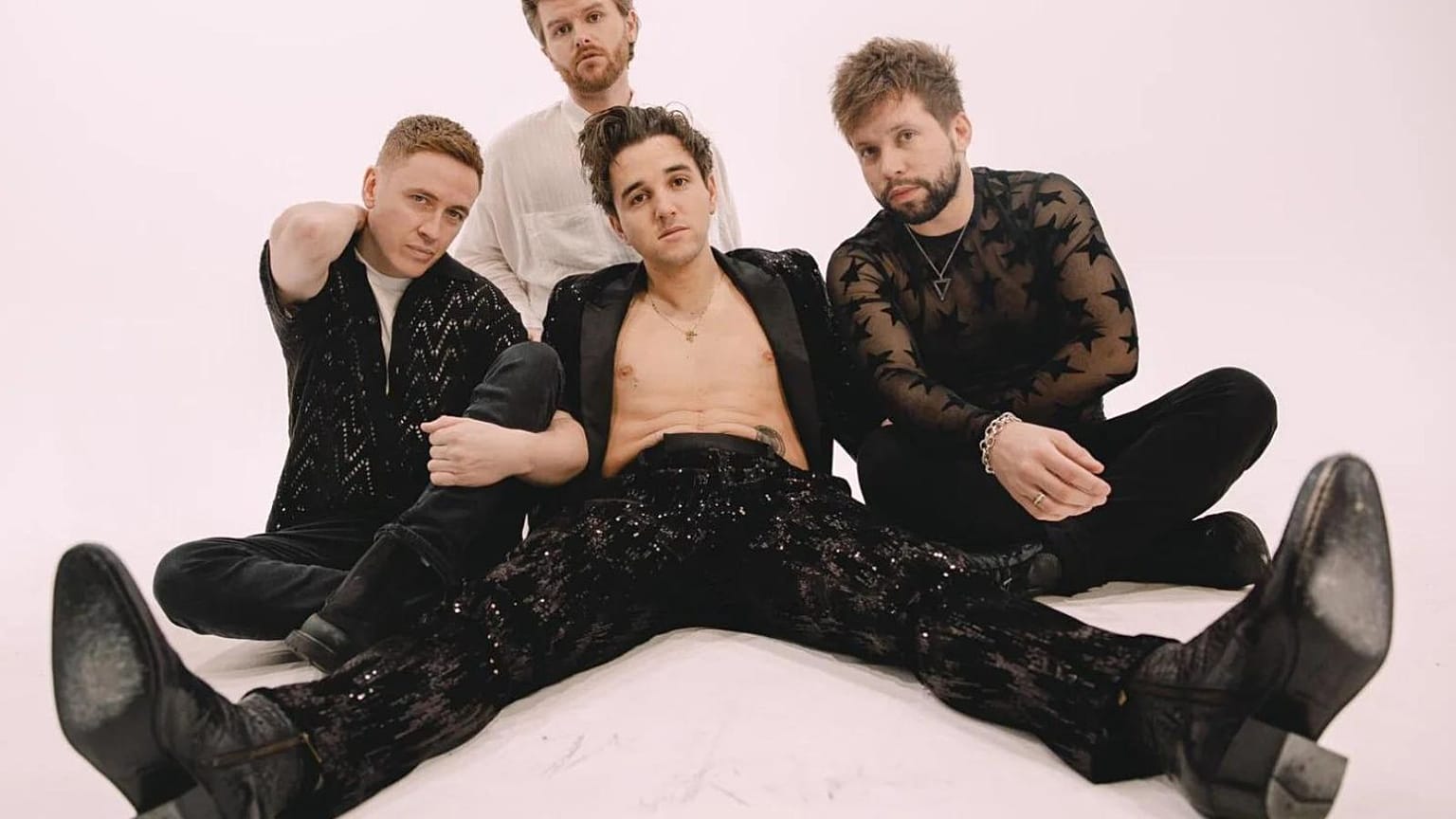 Eurovision hopefuls Wild Youth have cut ties with their creative director after alleged transphobic tweets