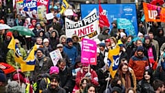 A demonstration in support of strikers is seen in central Manchester, England, Wednesday, Feb. 1, 2023.