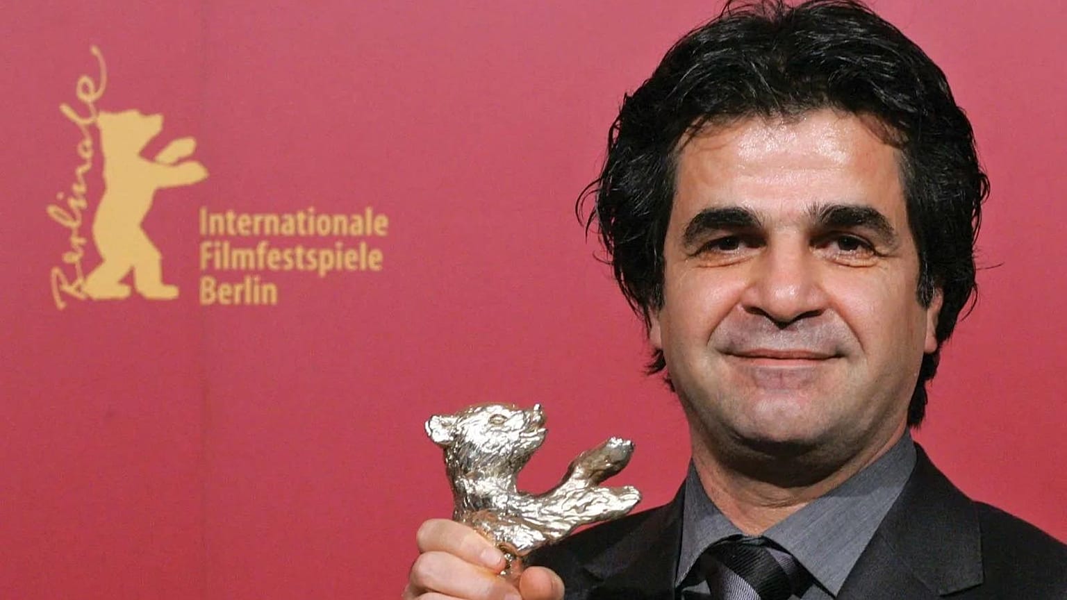 Jafar Panahi has reportedly left Iran for the first time in 14 years - here pictured at the Berlin Film Festival 
