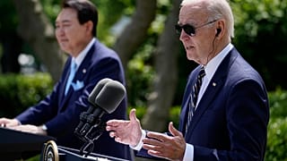 South Korea's President Yoon Suk Yeol listens as President Joe Biden speaks during a news conference in the Rose Garden of the White House on Wednesday, April 26, 2023, 