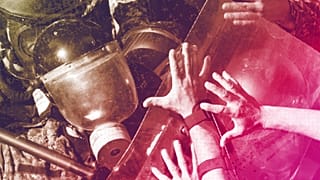 Lebanese riot police clash with demonstrators during a protest demanding better pay and living conditions in Beirut, April 2023