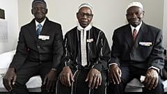 Ousmane Sagna, Oumar Dieme, and Guorgui M' Bodji, (left to right) African war veterans who fought for France, near Paris in 2016.
