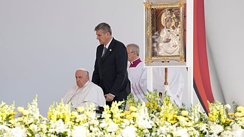 Pope Francis arrives on the altar for a mass in Kossuth Lajos' Square in Budapest, Hungary, Sunday, April 30, 2023. 