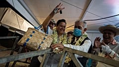 Pro-independence leader and former president of French Polynesia Oscar Temaru (C) celebrates the pro-independence Tavini party's victory, 30 April 2023