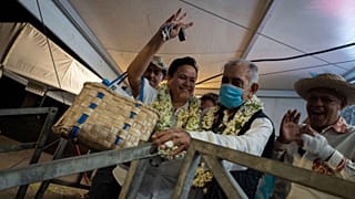 Pro-independence leader and former president of French Polynesia Oscar Temaru (C) celebrates the pro-independence Tavini party's victory, 30 April 2023
