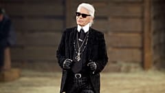 Met Gala subject Karl Lagerfeld takes a bow at the end of his Metiers d'Art fashion show in Dallas in 2013