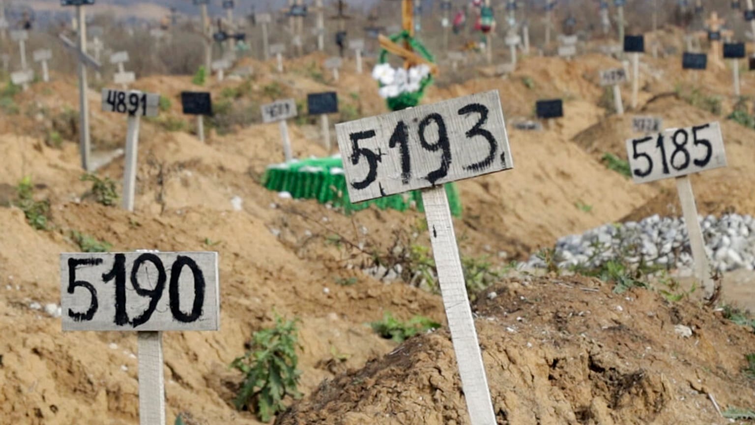 Nov. 16, 2022 image from video shows some of the new graves which have been dug since the Russian siege of Mariupol began. 