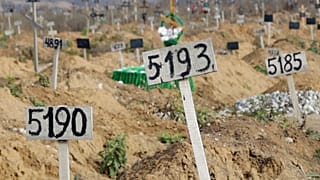 Nov. 16, 2022 image from video shows some of the new graves which have been dug since the Russian siege of Mariupol began. 