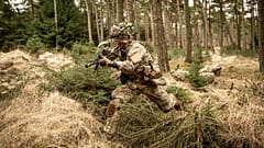 Soldiers from the Schleswig Infantry Regiment train at the Oksboel Shooting and Training Ground, Jutland, Denmark, Thursday March 16, 2023.