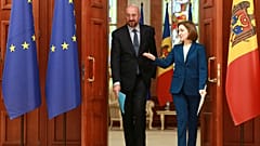 FILE: European Council President Charles Michel, left, walks with Moldova's President Maia Sandu after their meeting in Chisinau, Moldova, Tuesday, March 28, 2023.