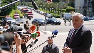 Italian Foreign Affairs Minister Antonio Tajani speaks to reporters prior to the plenary session of a bilateral meeting on the reconstruction of Ukraine