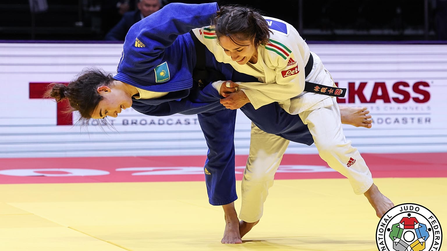 Sabina Giliazova of Russia and Blandine Pont of France, bottom, in action during the women's -48 category at the World Judo Championships in Doha, Qatar, Sunday, April 5, 2023
