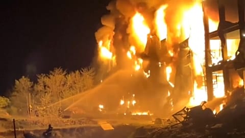 Firefighters battle blazes in Odesa strike