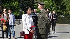 People attend a Victory Day event at the Soviet Memorial Tiergarten in Berlin, Germany, May 9, 2023.