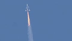 SpaceShipTwo space plane Unity and mothership separate as they fly way above Spaceport America in 2021