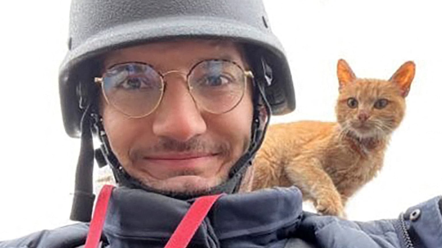 AFP journalist Arman Soldin snaps a selfie with a cat on his shoulder during an assignment for AFP in Ukraine. 