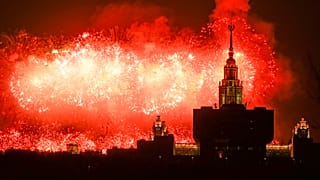 Fireworks explodes over the historic building of the Moscow State University in Russia, Tuesday, May 9, 2023 during Victory Day.
