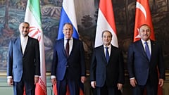 اجتماع بين وزير الخارجية الروسي ونظرائه  مولود جاويش أوغلو من تركيا وفيصل مقداد من سوريا وحسين أمير عبد اللهيان من إيران، في موسكو، في 10 أيار/مايو 2023 