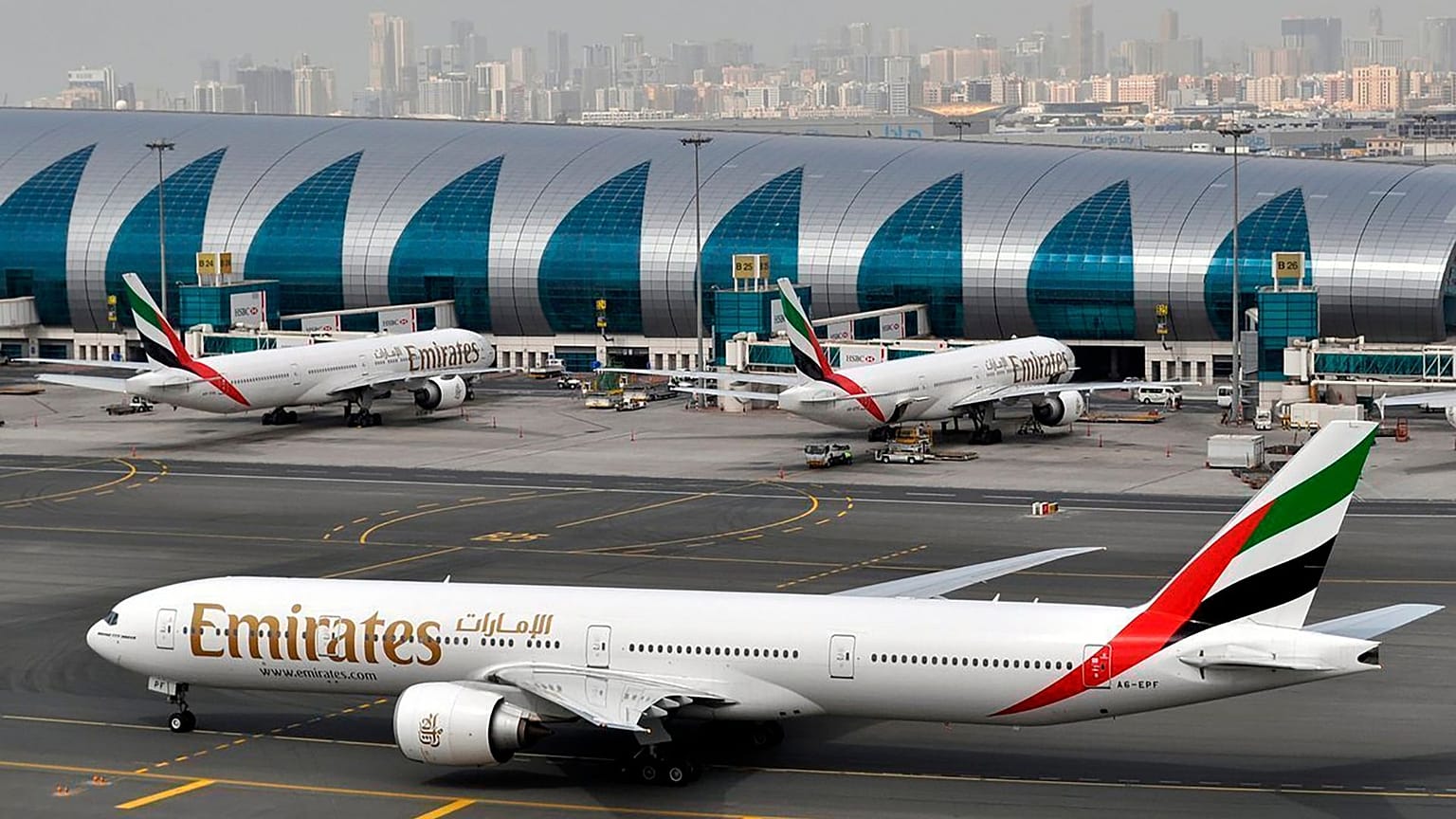 An Emirates plane taxis to a gate at Dubai International Airport at Dubai International Airport in Dubai.